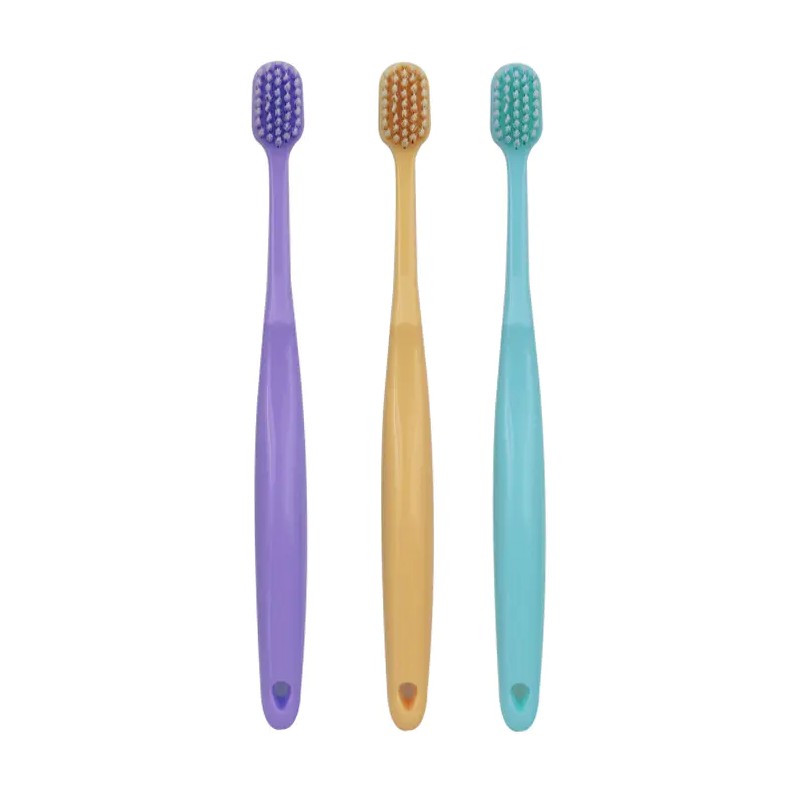 Wie benutzt man eine Handzahnbürste?